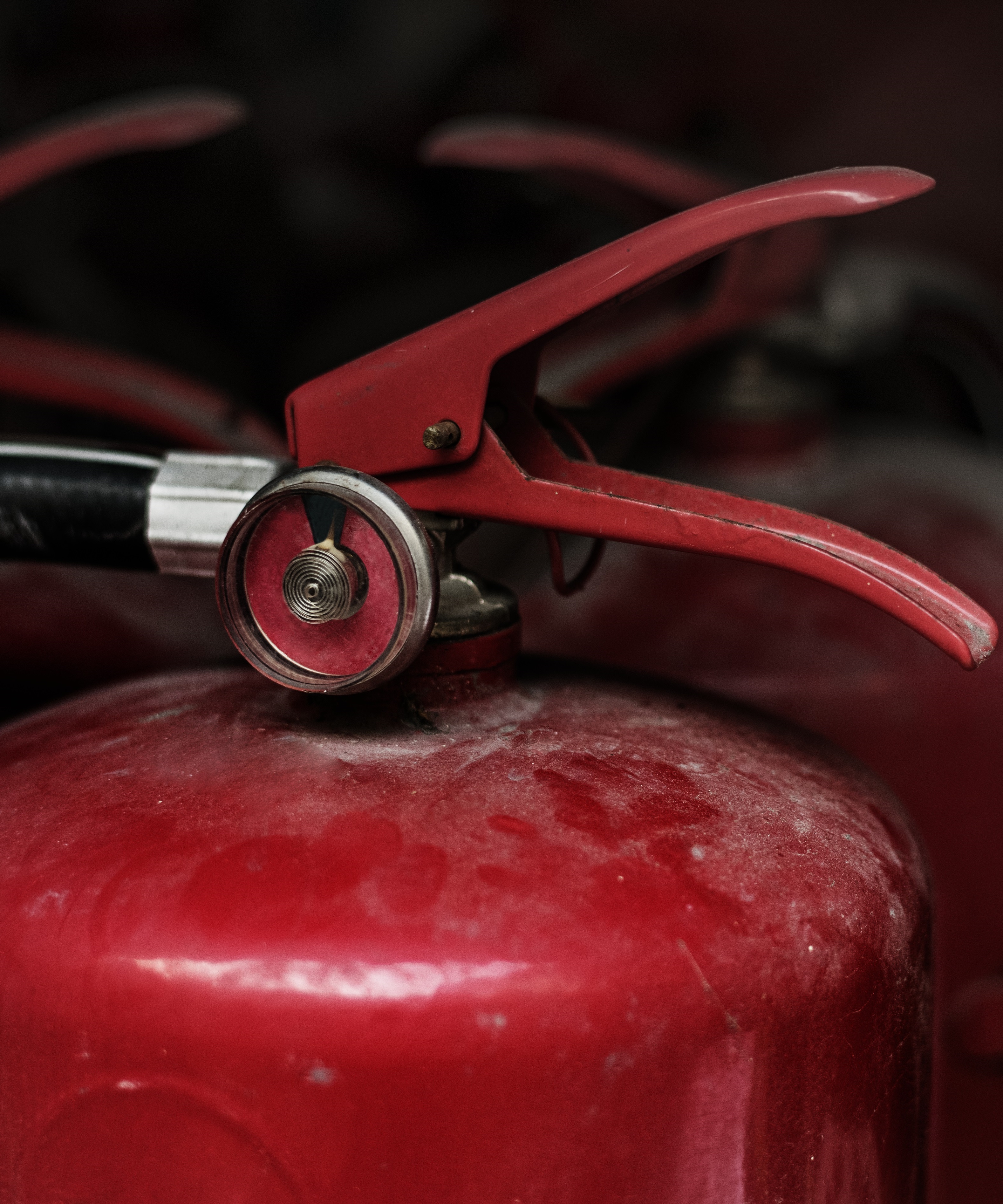 Closeup of red fire extinguishers
